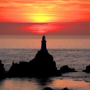 Corbiere Lighthouse sunset off the west coast of Jersey